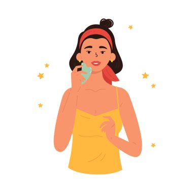 Yüz Gua Sha masajı. Gua sha taşlı kadın