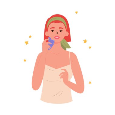 Yüz Gua Sha masajı. Gua sha taşlı kadın