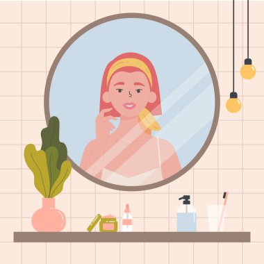 Aynada kendine bakan bir kadın..