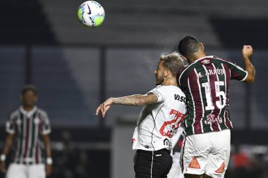 Rio, Brezilya - 13 Aralık 2020: Marcos Junior ve Michel Araujo oyuncuları Vasco 1 ve 1 Fluminense arasında Sao Januario Stadyumu 'nda Brezilya Şampiyonası ile oynanan maçta