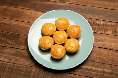 Empadinha, geleneksel Brezilya atıştırmalıkları genellikle tavukla doldurulur.