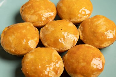 Empadinha, geleneksel Brezilya atıştırmalıkları genellikle tavukla doldurulur.