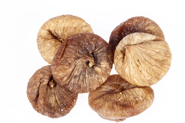 Alguns frutos de figo seco isolado no fundo branco — Fotografia de Stock