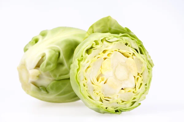 Algunas verduras de Bruselas brotan aisladas sobre fondo blanco — Foto de Stock