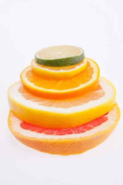 多彩的切片柑橘类水果堆关闭 — 图库照片