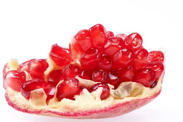 Piece of fruit of red pomegranate isolated on white background, — Stock Photo, Image