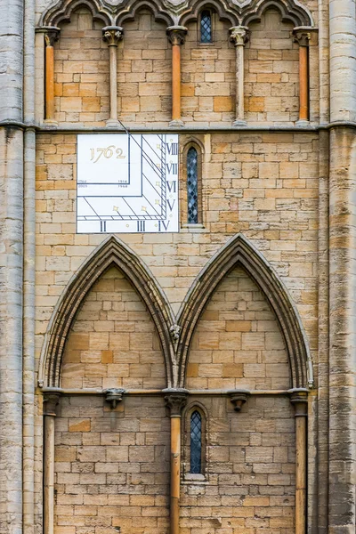 Peterbourough cathedral UK Lincolnshire facade detail showing a sundial — Stock Photo, Image