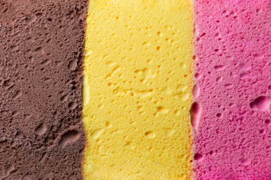 Colourful Neapolitan ice cream background and texture clipart
