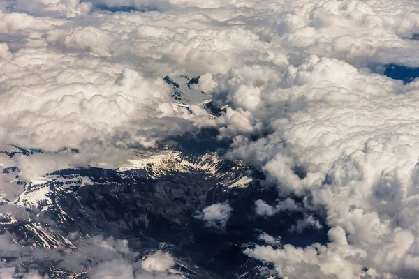 Above aerial plane view of Italian alps and cloudscape — Stock Photo, Image