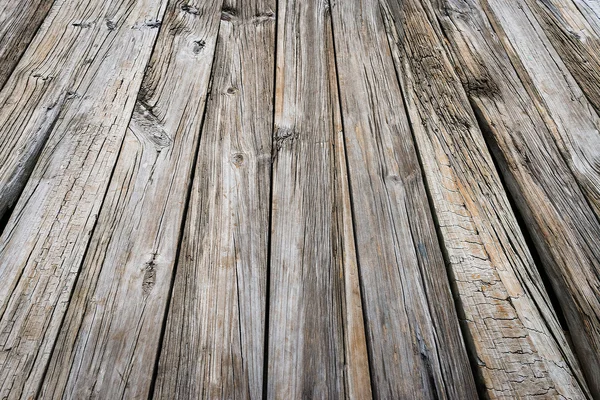 Staré dřevěné přístavních mol beach zvětralé texturu pozadí desky — Stock fotografie