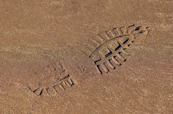 Stopy bot na vlhký písek textury — Stock fotografie