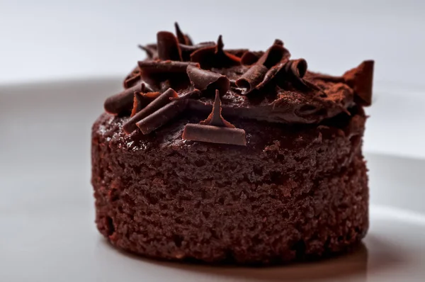 Bolo de muffin de chocolate belga rico e delicioso closeup macro lanche — Fotografia de Stock