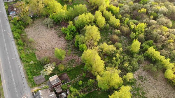 Aerial bird's eye view flying over a marsh in a rural area in Lutsk Ukraine