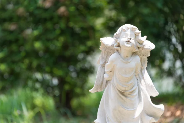 Angel statue in nature place in soft light — Stock Photo, Image