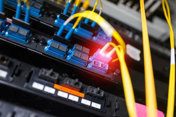 Fiber optic with servers in a technology data center — Stock Photo, Image