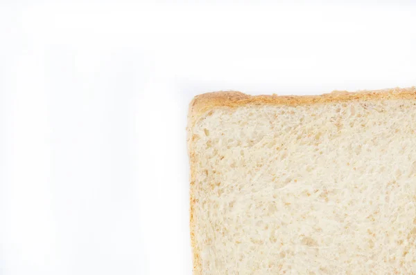 Pane bianco affettato su sfondo bianco — Foto Stock