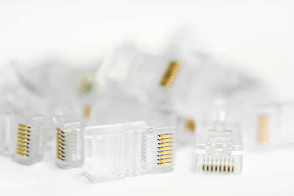 Netwerk kabel Rj45 hoofd op witte achtergrond — Stockfoto