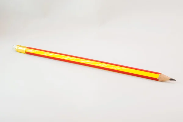 Ołówek w studio światła — Zdjęcie stockowe