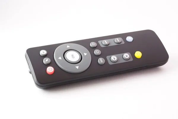 Remote TV in studio light — Stock Photo, Image