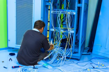 Fix network switch in data center room clipart