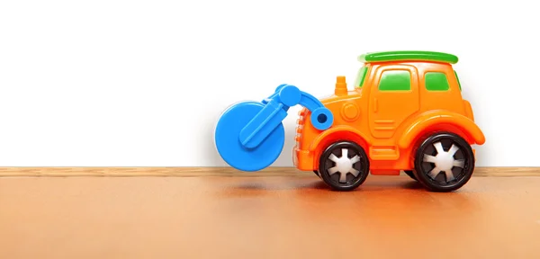 Plastic car on the floor — Stock Photo, Image