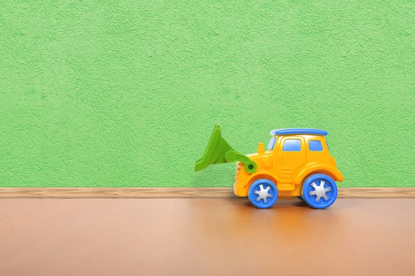 Plastic car on the floor — Stock Photo, Image