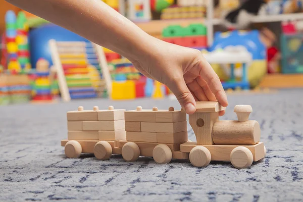 Houten trein in de speelkamer — Stockfoto