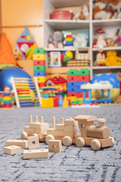 Wooden train in the play room — Stock Photo, Image