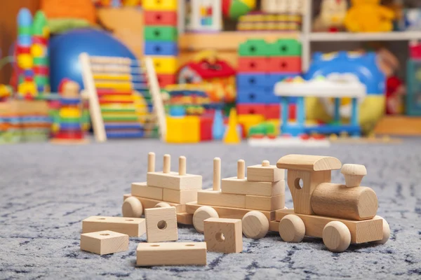 Wooden train in the play room — Stock Photo, Image