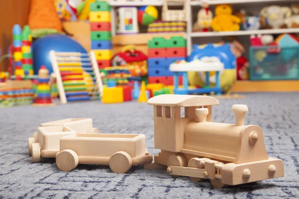 Wooden train in the play room — Stock Photo, Image