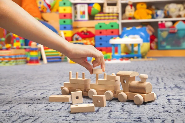 Wooden train in the play room — Stock Photo, Image