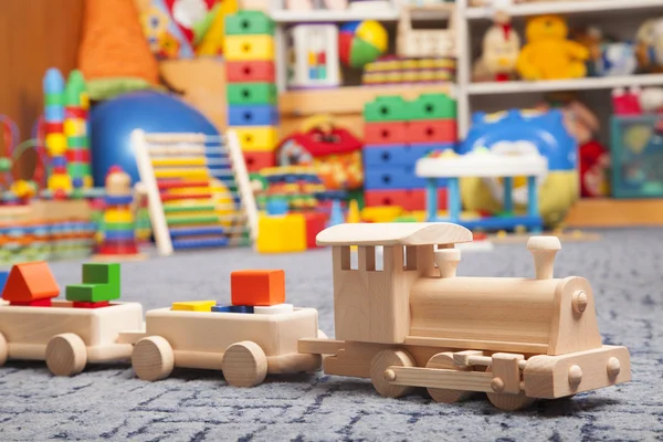 Wooden train in the play room — Stock Photo, Image