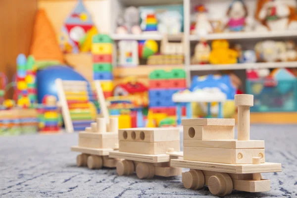 Wooden train in the play room — Stock Photo, Image