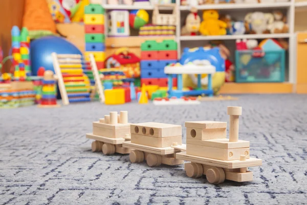 Wooden train in the play room — Stock Photo, Image