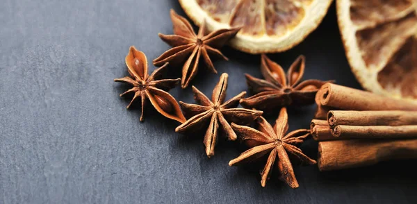 Christmas Spices Background Cinnamon Dried Oranges Anise Stone Background — ストック写真