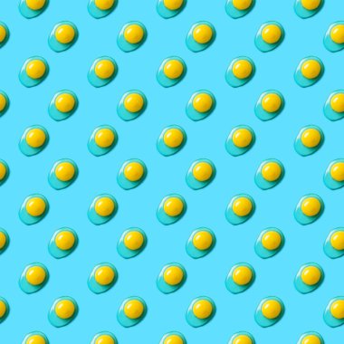 Mavi arka planda yumurta sarısı olan yemek deseni