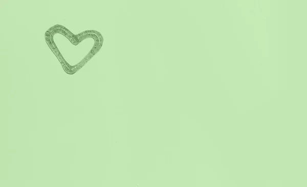 Silikon Kleines Herz Auf Grünem Hintergrund — Stockfoto