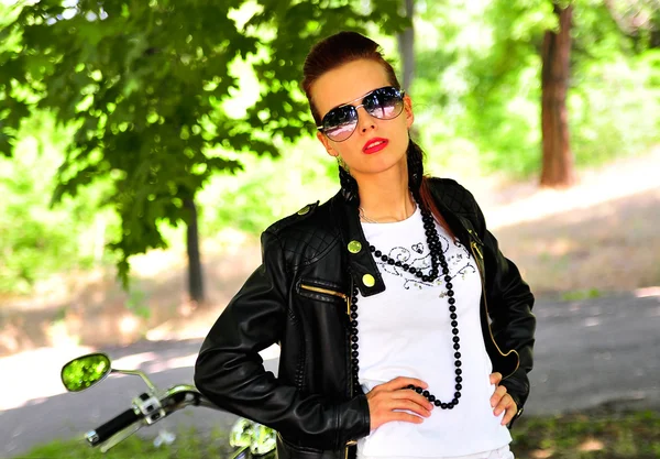 Stylized photo of woman and bike — Stock Photo, Image