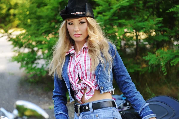 Young beautiful woman and bike — Stock Photo, Image