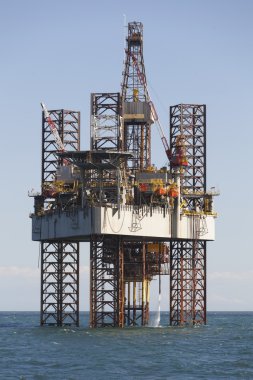 Drilling rig at sunny day clipart