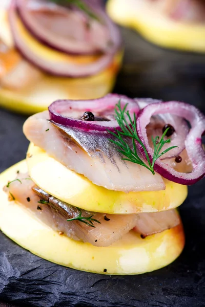 Appetizer canape with herring, apples — Stock Photo, Image