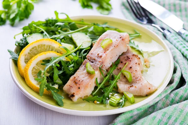 Slice steamed fish with spicy sauce and salad Stock Picture