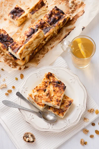 Appetizing cottage cheese pie with raisins Stock Photo