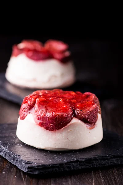 Cheese dessert with strawberry on black background — Stock Photo, Image