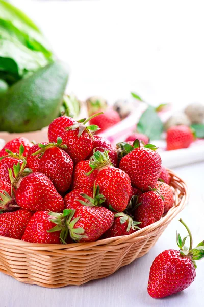 Fresh strawberry in the basket on white table — Stock Photo, Image