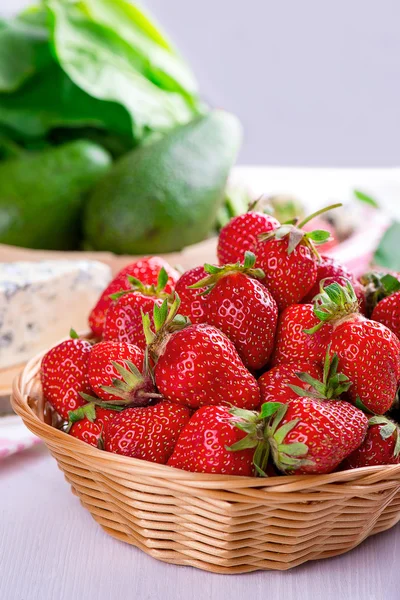 Fresh strawberry in the basket on white table — Stock Photo, Image