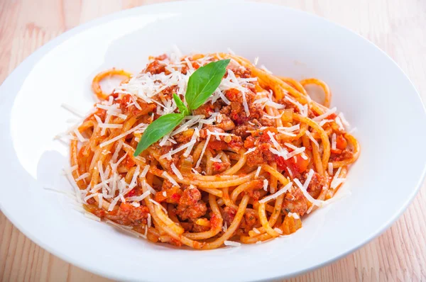 Spaghetti bolognese on white plate — Stock Photo, Image