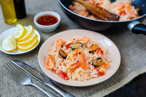 Spanish dish paella with seafood, shrimps in pan — Stock Photo, Image
