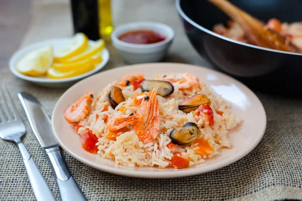 Spanish dish paella with seafood, shrimps in pan — Stock Photo, Image