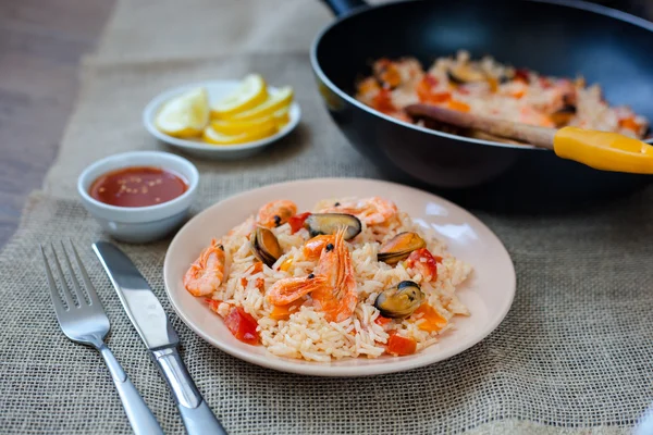 Spanish dish paella with seafood, shrimps in pan — Stock Photo, Image